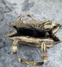 Load image into Gallery viewer, Animal print bag with mini coin purse. In like-new condition. 5.5" W / 12" H / 12" L