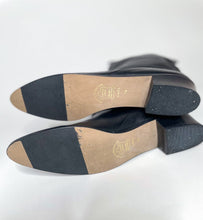 Load image into Gallery viewer, Beautifully made (like new) black leather boots. Made in Argentina. The brand isn't listed but might be Mister. SIZE: 7M MODEL: wears size 6 COMPOSITION: Genuine Leather