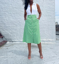 Load image into Gallery viewer, Vintage 60s/70s Gingham A line Button Up Skirt By Saks Fifth Avenue. Pinned to fit. SIZE: Not listed Measures approximately: 27" waist / 21.5" hip / 28" length MODEL: 5'1, 119lbs, size 4 COMPOSITION: Not listed
