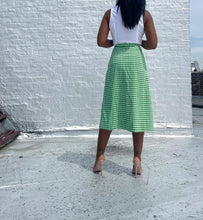 Load image into Gallery viewer, Vintage 60s/70s Gingham A line Button Up Skirt By Saks Fifth Avenue. Pinned to fit. SIZE: Not listed Measures approximately: 27" waist / 21.5" hip / 28" length MODEL: 5'1, 119lbs, size 4 COMPOSITION: Not listed