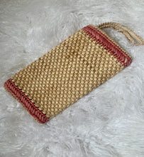 Load image into Gallery viewer, Braided straw clutch bag with handle. In excellent condition. Measures approximately: 12" W / 6.5" H / 7" Handle
