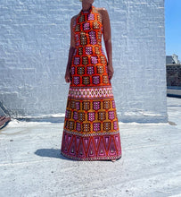 Load image into Gallery viewer, Vintage Mod Print Halter Maxi Dress. SIZE: Not listed, best fits M Measures approximately: 16.5" pit to pit / 14.5" empire waist/ 16" waist / 22" hip / 55.5" length (Measurements taken laying flat, double where applicable) MODEL: 5'1, 119lbs, size 4 COMPOSITION: Not listed We kindly remind you vintage items have been pre-loved, therefore, they may show signs of wear. Any major flaws will be noted. Feel free to email us with any questions before purchasing.