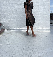 Load image into Gallery viewer, Gorgeous Iridescent Bronze Quilted Dress By Black Dash. SIZE: 0 but fits me as a size 4 Measures approximately: 14" pit to pit / 13" waist / 42" length (Measurements taken flat, double where applicable) MODEL: 5'1, 119lbs, size 4 COMPOSITION: Not listed