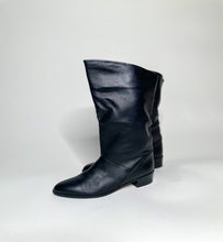 Load image into Gallery viewer, Beautifully made (like new) black leather boots. Made in Argentina. The brand isn't listed but might be Mister. SIZE: 7M MODEL: wears size 6 COMPOSITION: Genuine Leather