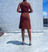 Load image into Gallery viewer, Vintage chocolate-colored shift dress. In excellent condition. SIZE: No label, best fits S/4 Measures approximately: 16.5" pit to pit / 14.5" waist / 37" length (Measurements taken laying flat, double where applicable) MODEL: 5'1, 119lbs, size 4