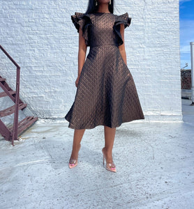 Gorgeous Iridescent Bronze Quilted Dress By Black Dash.   SIZE: 0 but fits me as a size 4    Measures approximately: 14" pit to pit / 13" waist / 42" length   (Measurements taken flat, double where applicable)   MODEL: 5'1, 119lbs, size 4  COMPOSITION: Not listed
