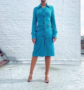 Emerald blue/green slinky button-up dress with pockets By Roshani.   SIZE: 38 best fits S/M    Measures approximately: 18" pit to pit / 14.5" waist / 39.5" length 