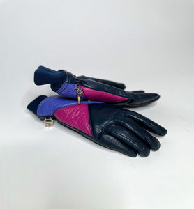 The coolest vintage leather ski gloves By Grandoe. In excellent condition.  Best fits S/M