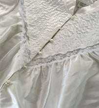 Load image into Gallery viewer, White Victorian Style Cotton/ Poly robe with pearl buttons and lace details By Character.   **Missing one button, tiny run-in fabric on the arm. See the last photo.   SIZE: L    Measures approximately: 24&quot; pit to pit / 29&quot; wide / 51&quot; length 
