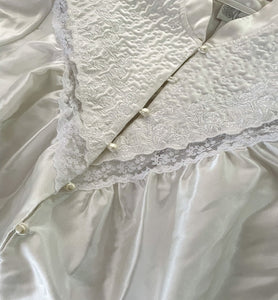 White Victorian Style Cotton/ Poly robe with pearl buttons and lace details By Character.   **Missing one button, tiny run-in fabric on the arm. See the last photo.   SIZE: L    Measures approximately: 24" pit to pit / 29" wide / 51" length 