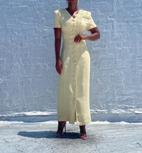 Load image into Gallery viewer, Vintage soft yellow 90s button-up dress By Maggy London.   SIZE: 8     Measures approximately: 19.5&quot; pit to pit / 16.5&quot; waist / 21.5&quot; hips / 51&quot; length   (Measurements taken laying flat, double where applicable)   MODEL: 5&#39;1, 119lbs, size 4  COMPOSITION: 100% Polyester 
