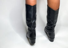 Load image into Gallery viewer, Beautifully made (like new) black leather boots. Made in Argentina. The brand isn&#39;t listed but might be Mister.   SIZE: 7M     MODEL: wears size 6  COMPOSITION: Genuine Leather 

